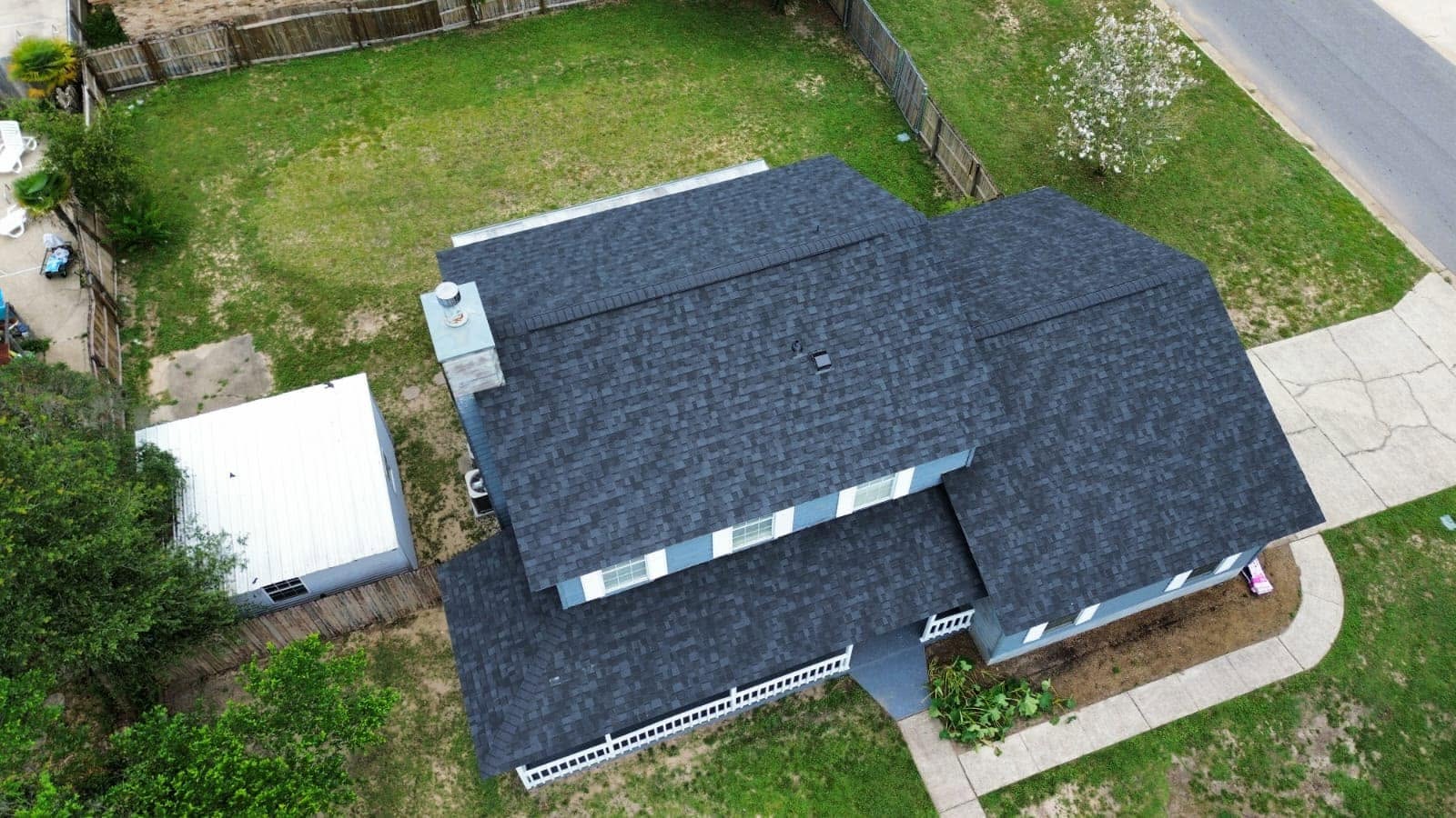 Durable new architectural shingle roof installed by Elite-Pro